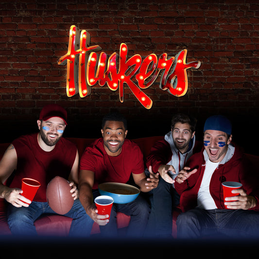 Nebraska Cornhuskers lighted metal man cave sign