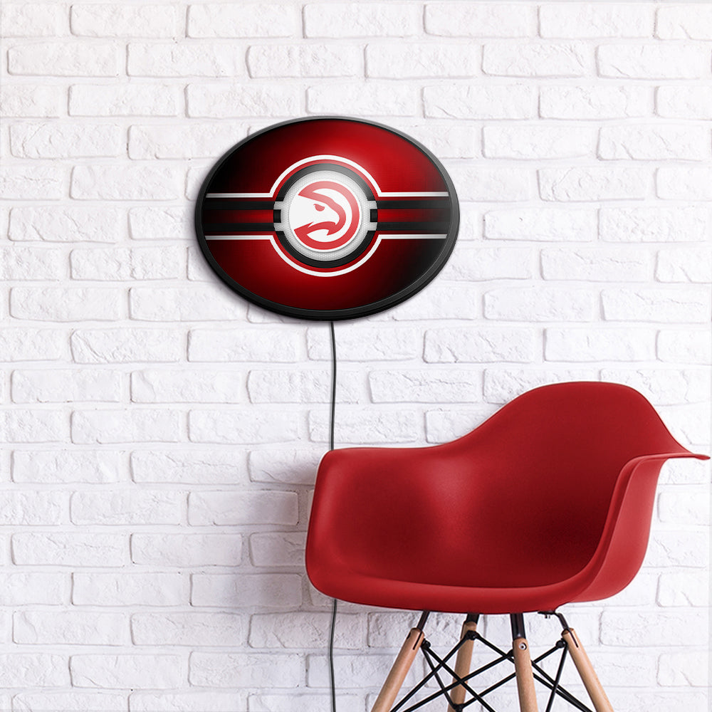Atlanta Hawks Slimline Oval Lighted Wall Sign Room View