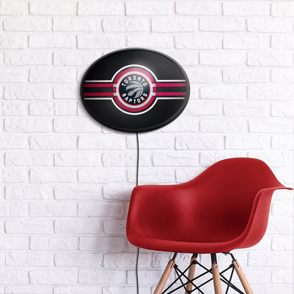 Toronto Raptors Slimline Oval Lighted Wall Sign Room View