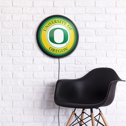 Oregon Ducks Slimline Round Lighted Wall Sign Room View