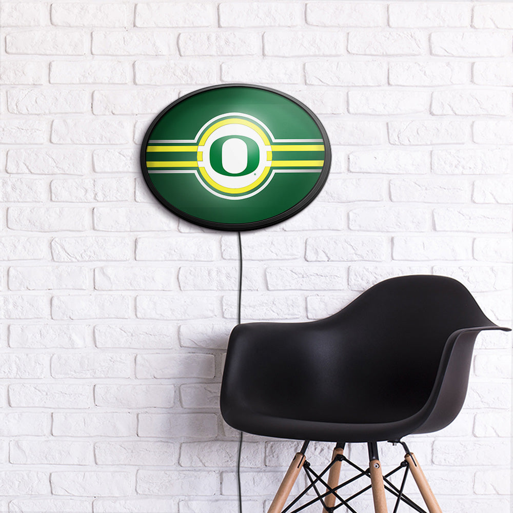 Oregon Ducks Slimline Oval Lighted Wall Sign Room View
