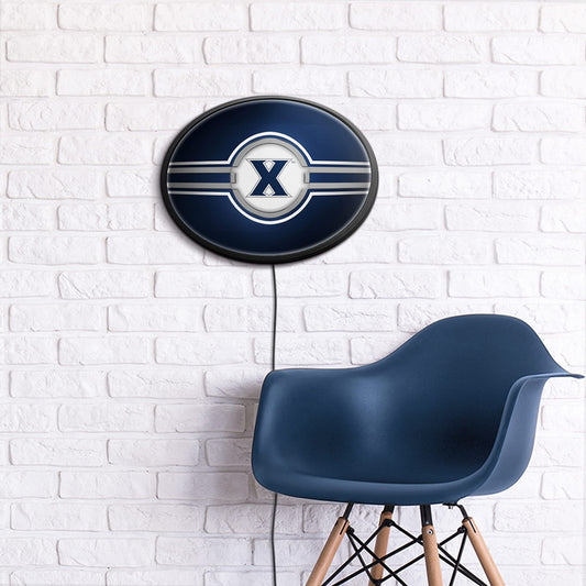 Xavier Musketeers Slimline Oval Lighted Wall Sign Room View