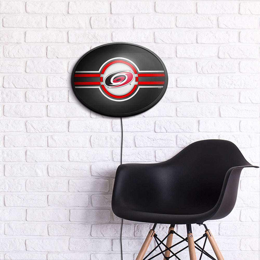 Carolina Hurricanes Slimline Oval Lighted Wall Sign Room View